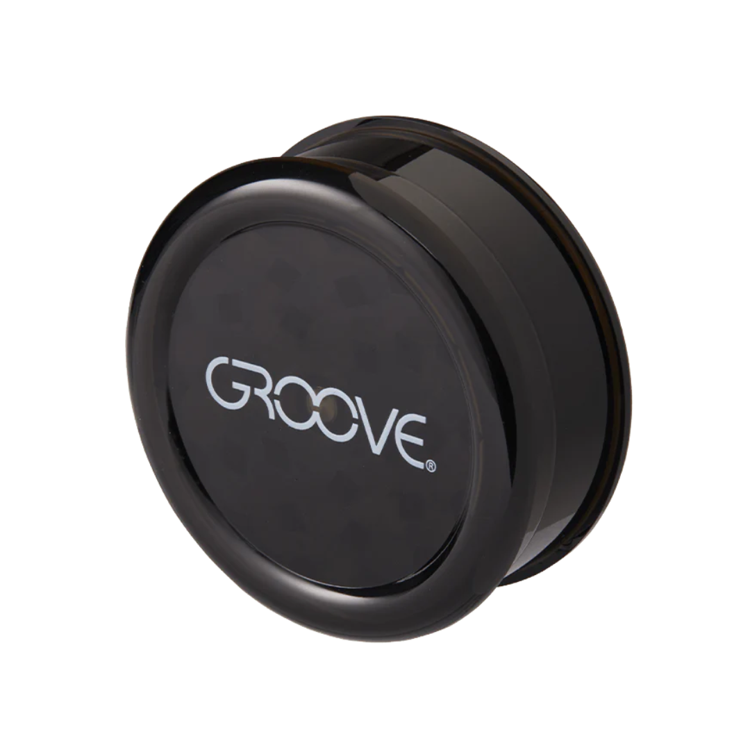 Sleek black Groove acrylic grinder with magnetic lid and sharp teeth. Durable, discreet, and great for daily use.