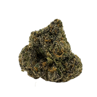 Dense emerald-green bud with flat heart-shaped structure, orange hairs, and amber-frosted trichomes.