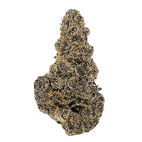 Exotic Blockberry THCA flower showing deep purple buds with heavy trichome coverage