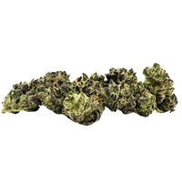 Premium Smalls Ice Cream Cake THCA flower showing dense forest-green buds with crystalline trichomes.  