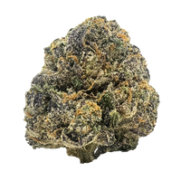 Karmel Kandy strain has forest green and purple buds with caramel-colored hairs, coated in trichomes, and a rich, buttery caramel aroma.