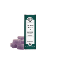 A bottle of Huckleberry Live Resin Delta 9 Gummies by Modern Herb Co with three gummy candies in front, against a white background available at Consider It Flowers. 