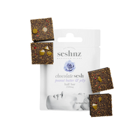 Seshnz Peanut Butter & Jelly Half Bar – milk chocolate, peanut butter, berry, and mushrooms in 4 squares. Shop premium mushroom chocolate now.